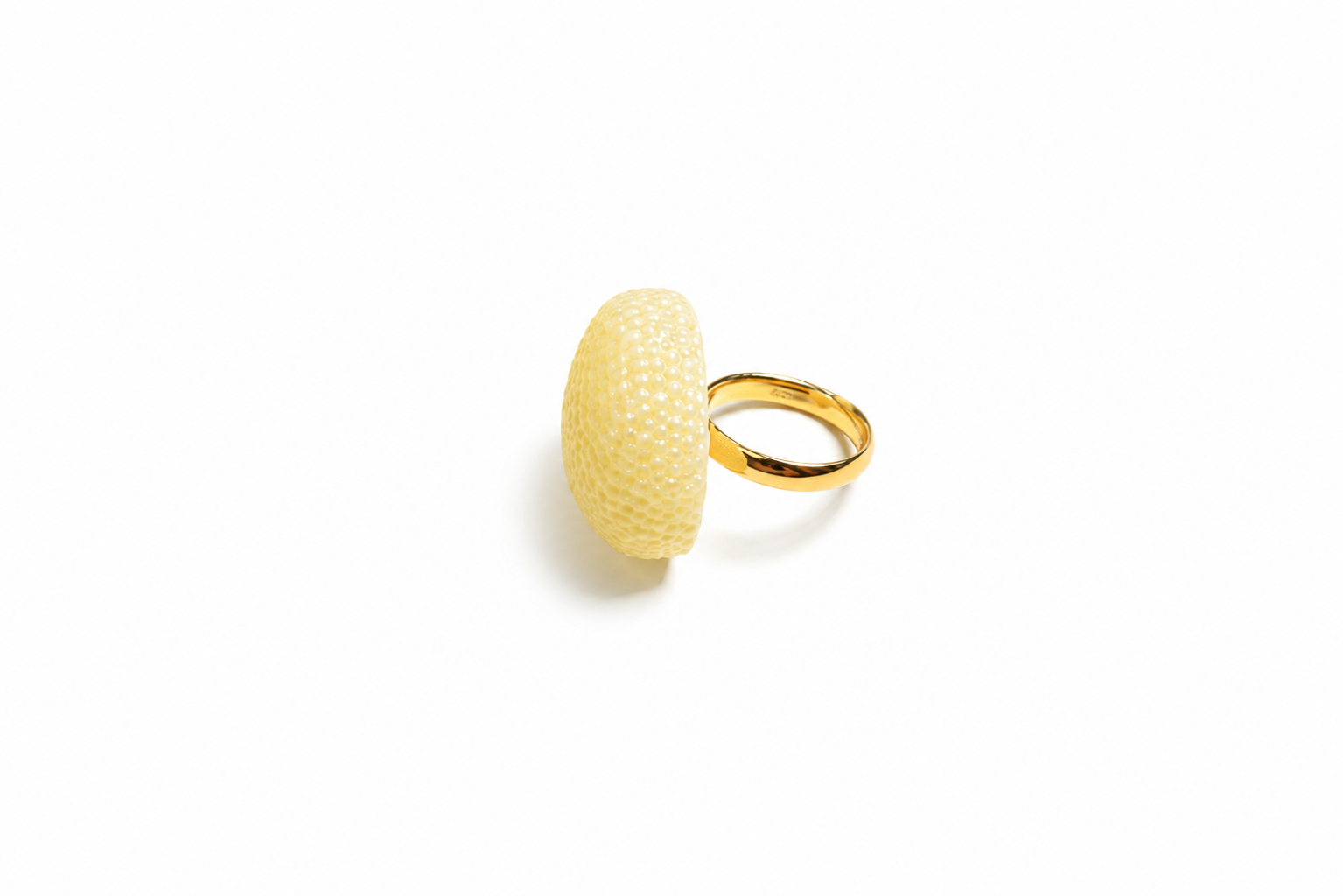 Lilou Baltic amber ring in lemon yellow amber, side view showing textured stone — handcrafted in Lithuania by AMBER999